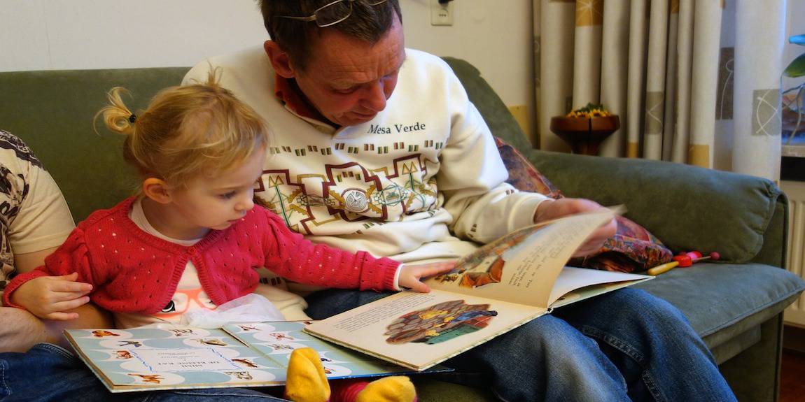 Grandpa Granddaughter Reading Book
